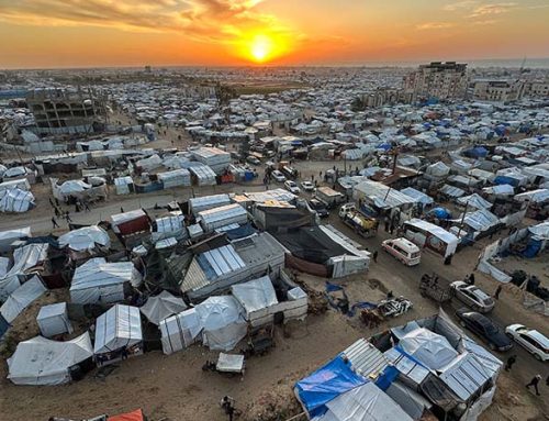 Israel bans dozens of aid groups from Gaza, including Caritas, drawing condemnation